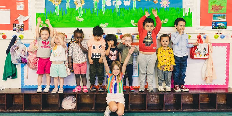 Children posing together at Puddleduck Nursery